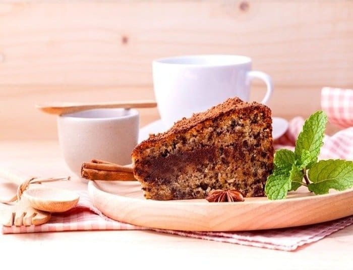 Slice of cake with a cup of coffee