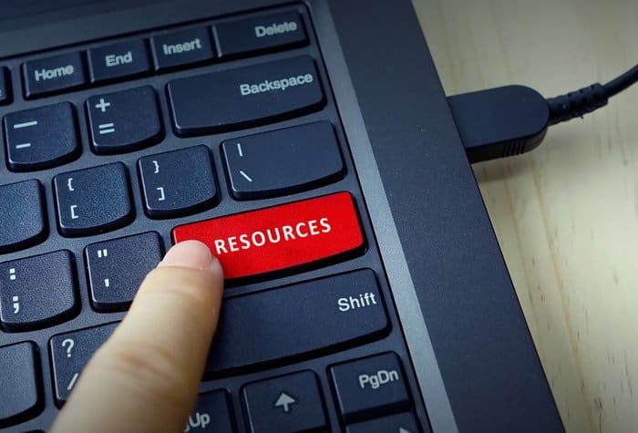A keyboard with the word "resources"