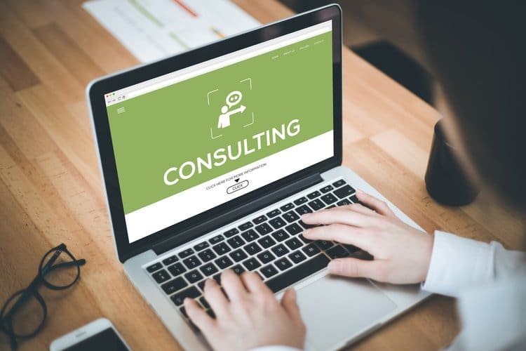 A man searching online about business consulting