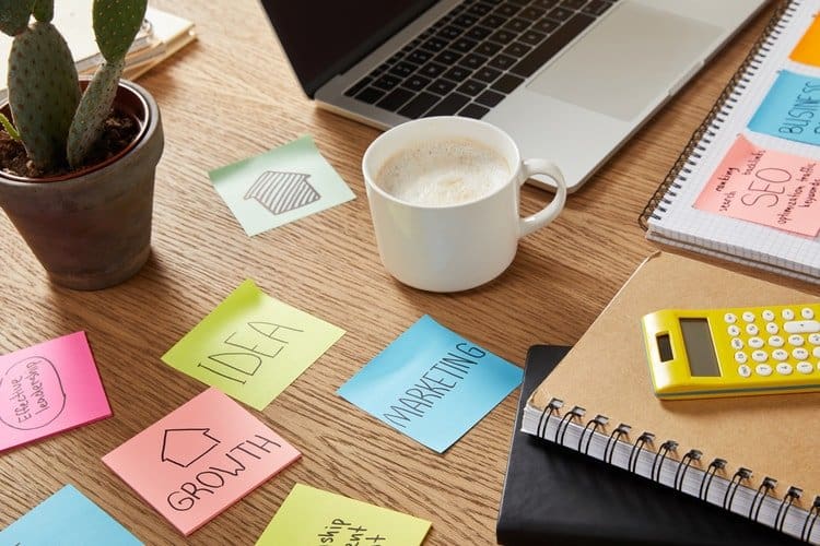 How to Get Your Product in Stores (in 5 Easy Steps) 1 Colorful sticky notes on a desk