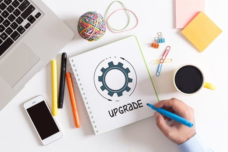 How to Get Your Product in Stores (in 5 Easy Steps) 3 A man drawing on a white notebook