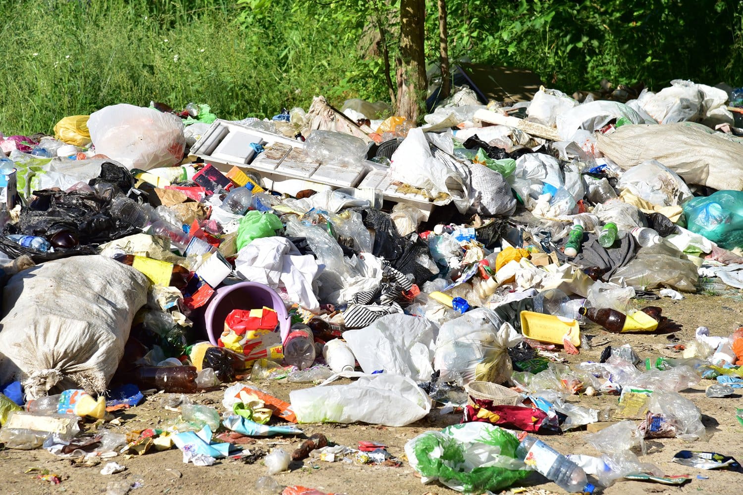 A large number of accumulated plastic bags and plastic packaging of household waste