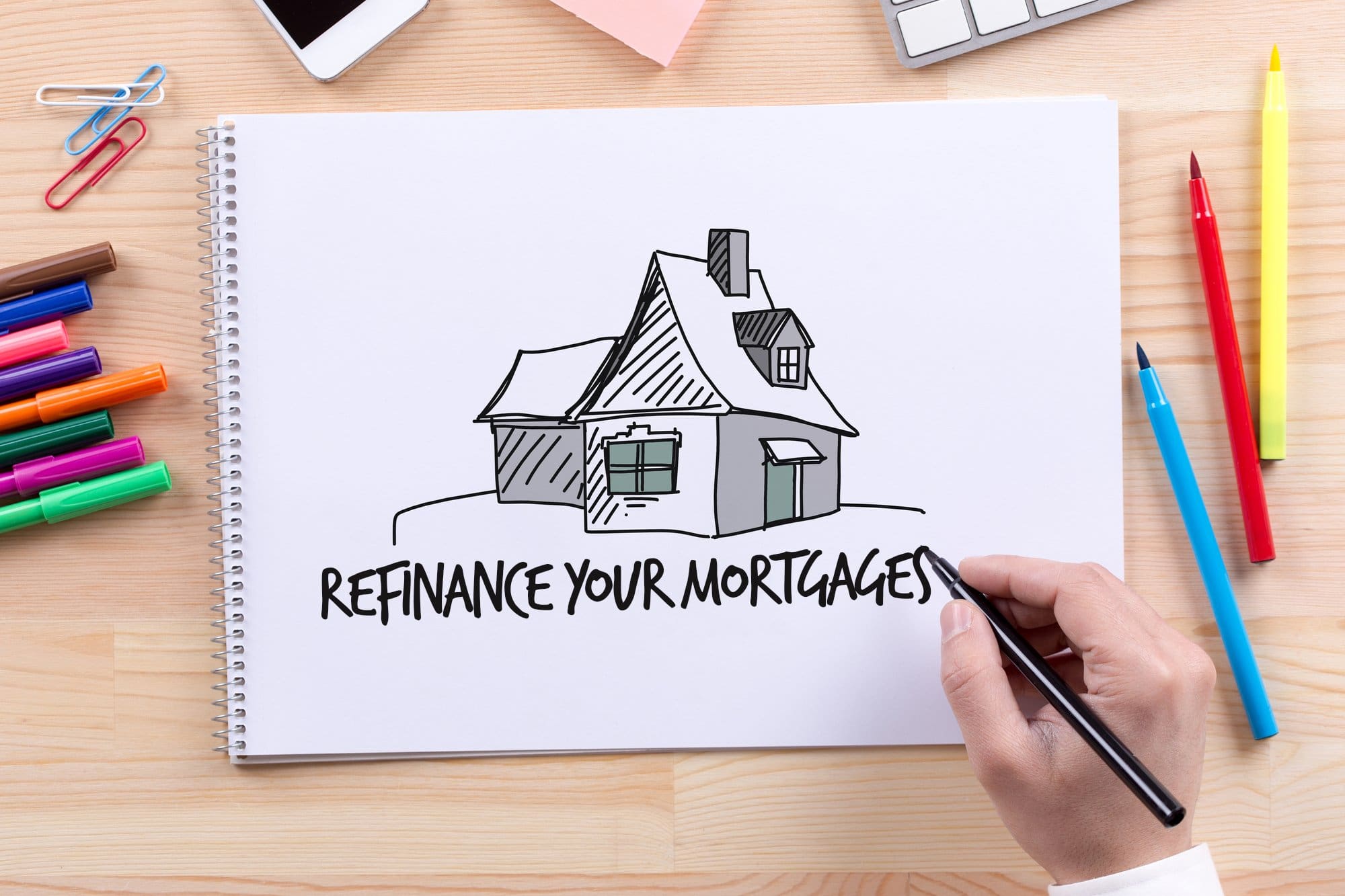 How to Get a Business Loan (in 4 Easy Steps) 12 Man drawing a house on sketchbook