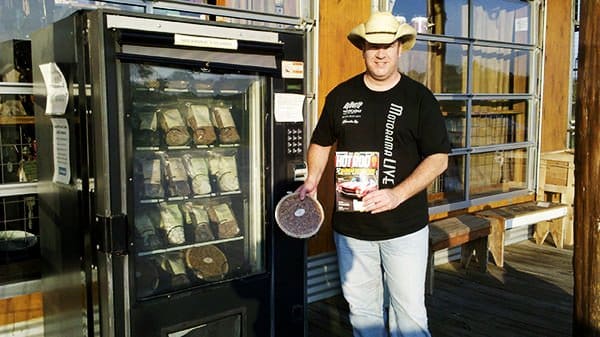 Man in front of vending machine