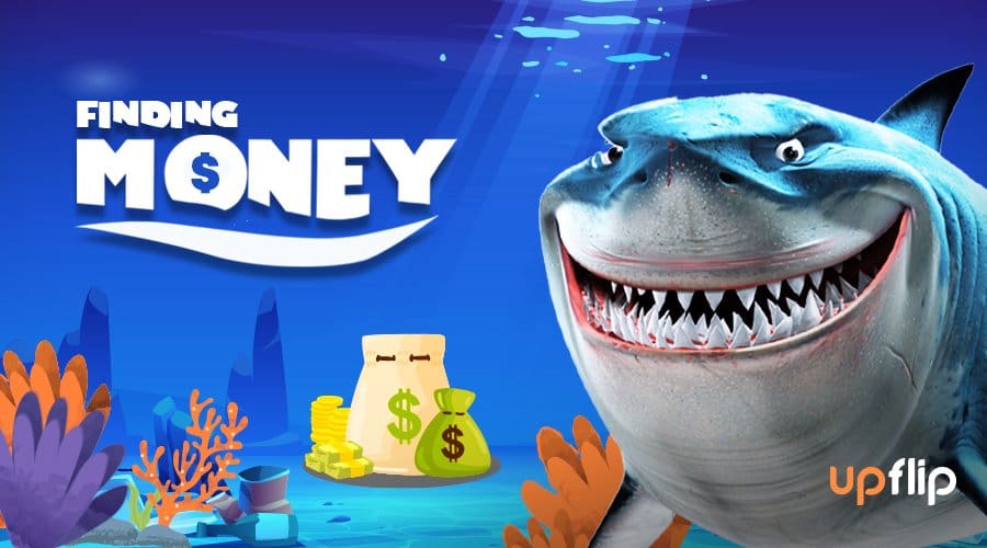 View from beneath the sea with a shark and money