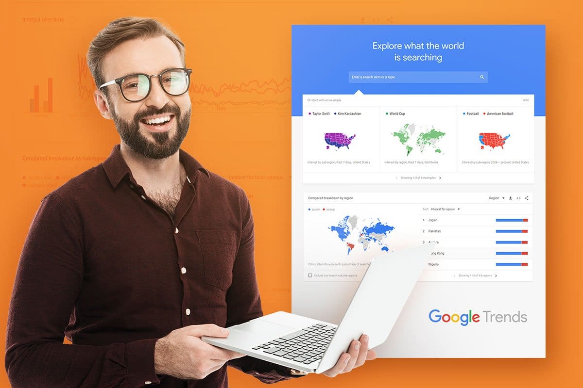 man holding a website with a google trends page mockup