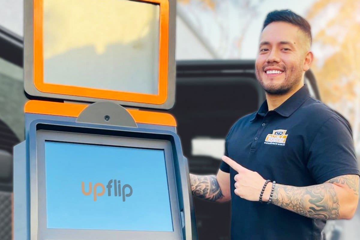 How to Start a $15M/Year ATM Business 6 Paul behind a truck unloading ATM placement for best foot traffic