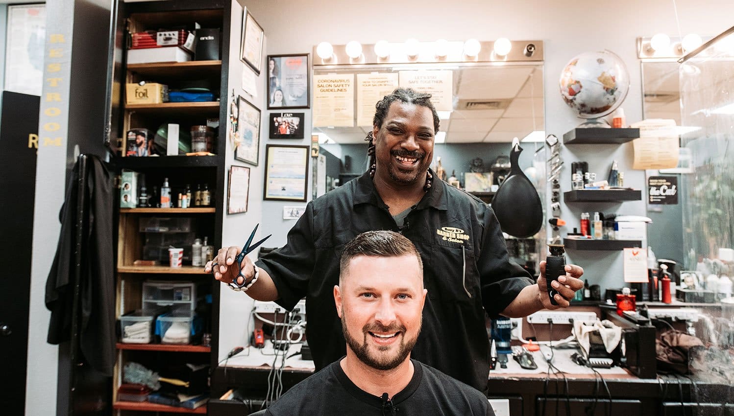 Busy bs barbershop owner Bernard Franklin