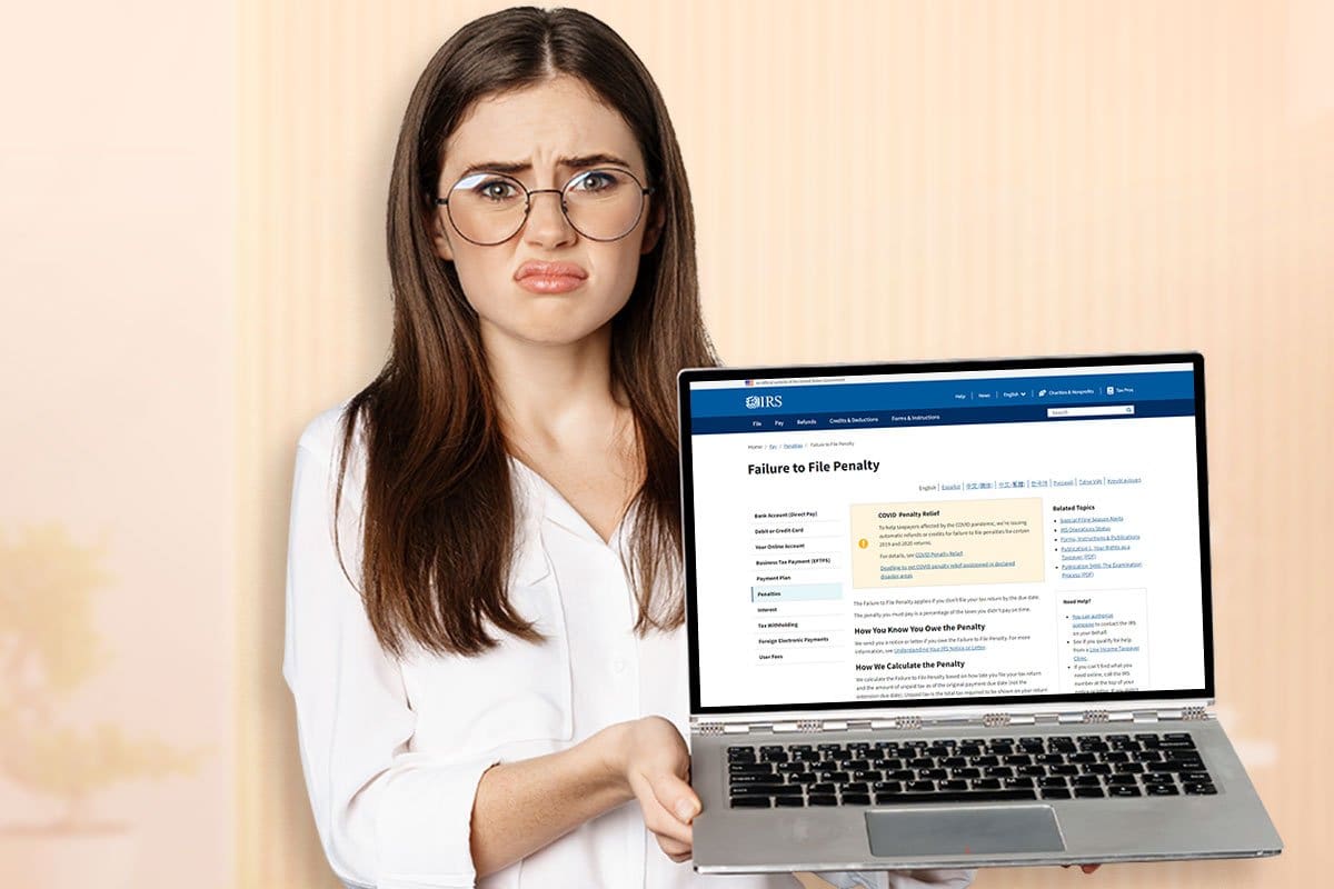 How to Start a $15M/Year ATM Business 12 Frustrated young woman wearing glasses holding laptop showing IRS failure to file page