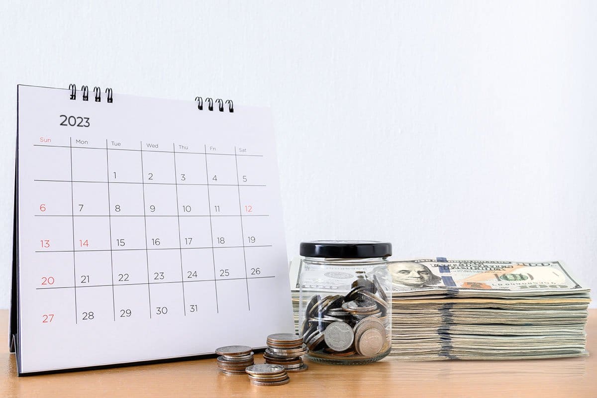 How to Start a $15M/Year ATM Business 9 Service calendar next to jar of coins and stacked bills