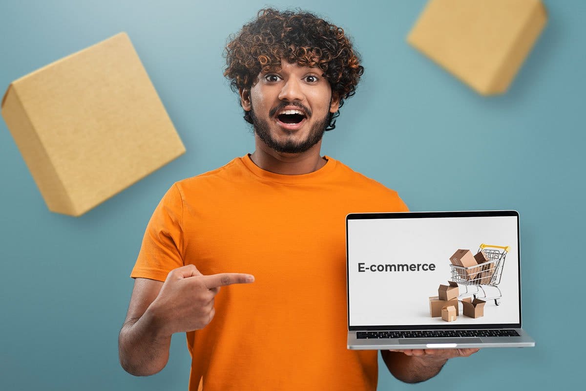 23 eCommerce Business Ideas You Can Start Today 14 Young man wondering "Is eCommerce profitable" and searching for answers about e-commerce on his laptop