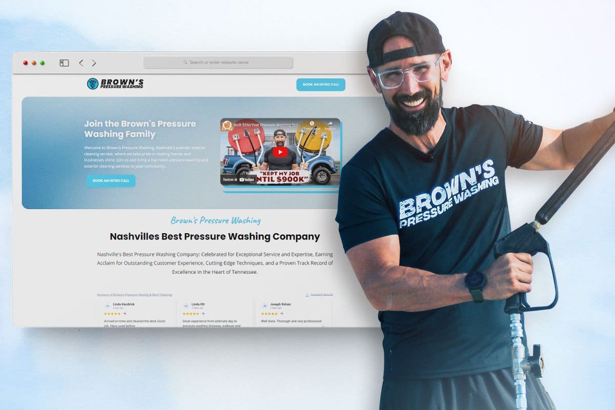 Brown’s Pressure Washing owner standing in front of a screenshot of the Brown’s home page