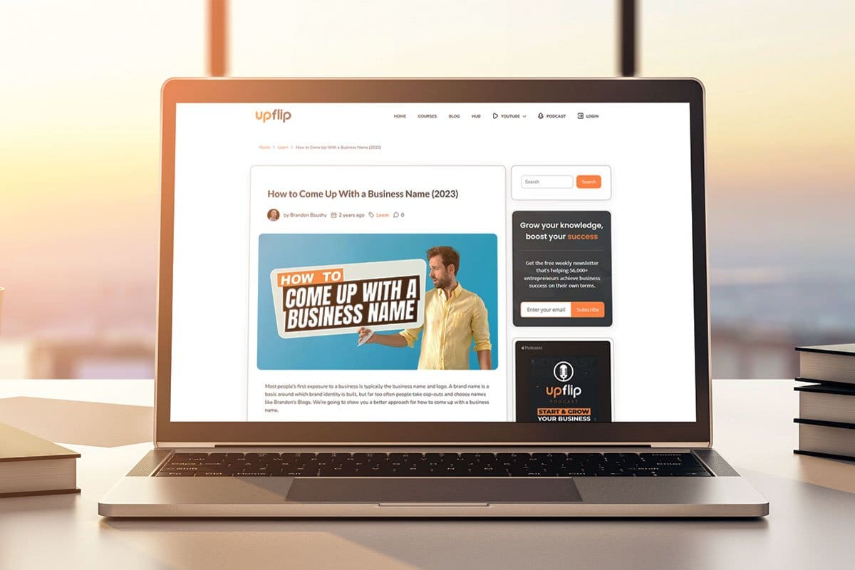 How to Grow a Podcast (2025) 3 UpFlip’s how to come up with a business name blog post on a laptop
