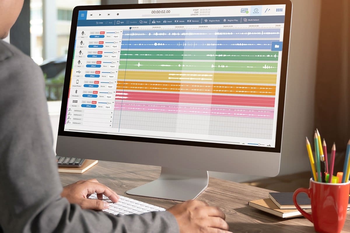 How to Grow a Podcast (2025) 6 Audio engineer editing recordings on a desktop computer