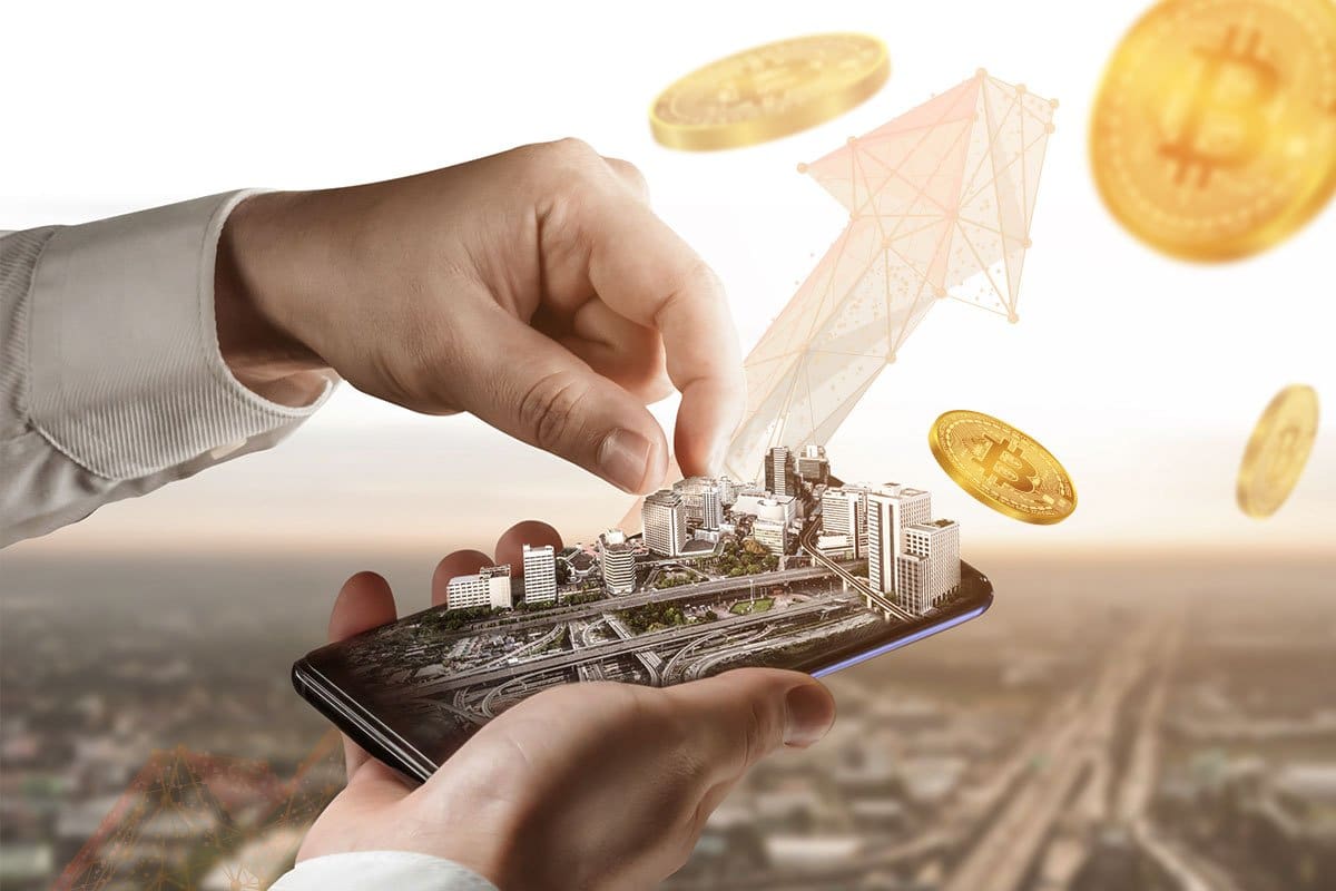 Digital Real Estate for Beginners (2025) 2 Concept of a cityscape emerging from a smartphone held in two hands surrounded by coins and an upward trending arrow