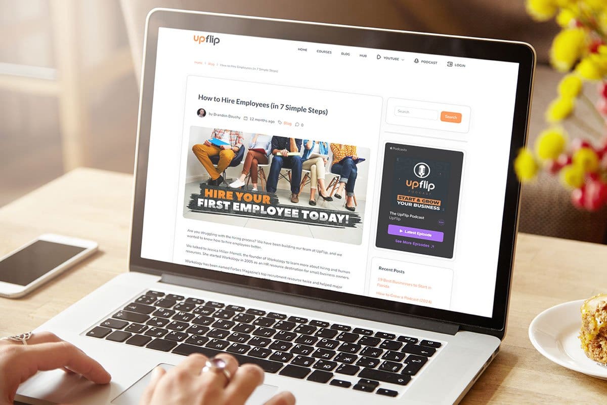 UpFlip hiring guide article on a laptop