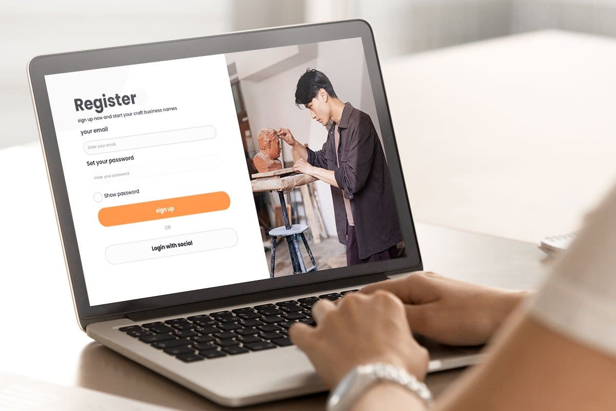 437 Stand-Out Craft Business Names 8 Business owner using a laptop to register their sculpture business online