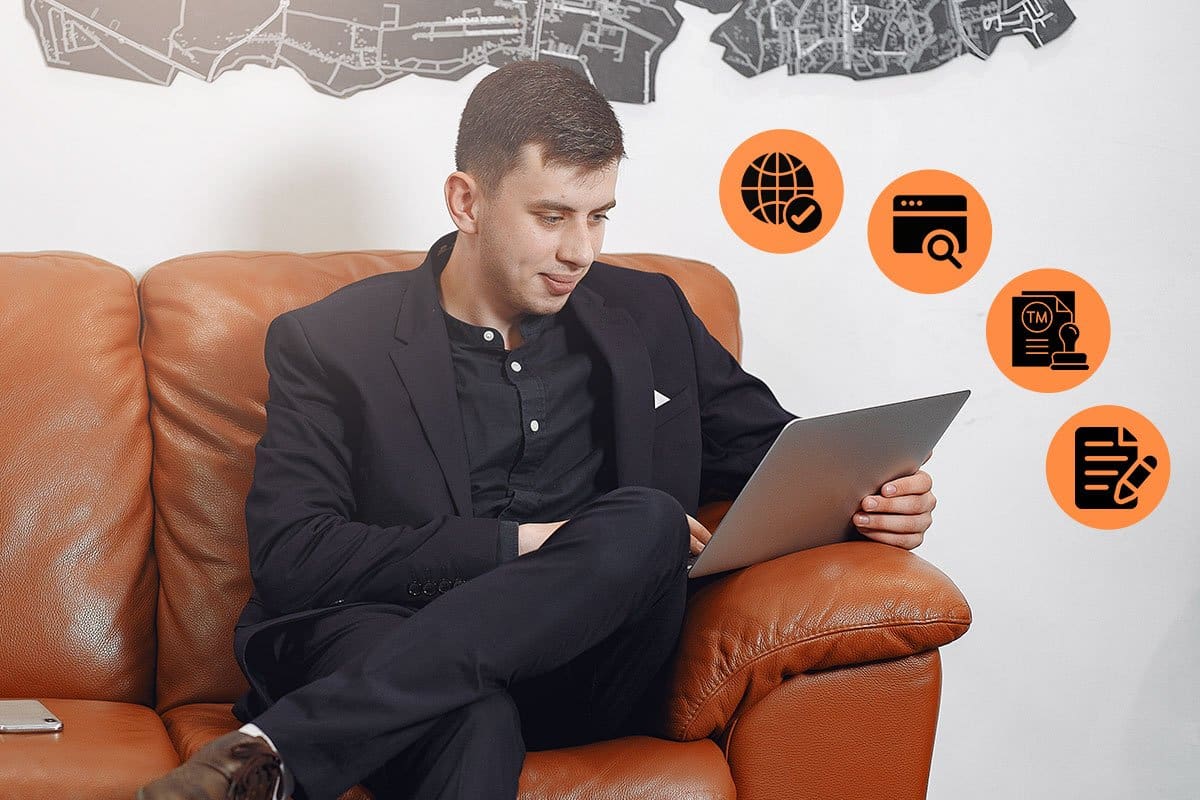 338 Eye-Catching Travel Agency Names 8 A young travel agent doing research on his tablet with icons for Wi-Fi, documents, and trademarking hovering overhead