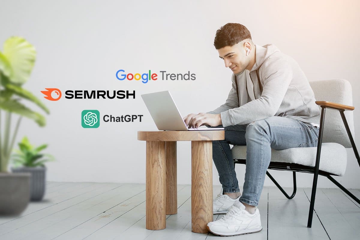 522 Etsy Shop Names You’ll Love (2025) 2 A casually dressed man researching Etsy shop names using a laptop with Google Trends, Semrush, and ChatGPT logos hovering beside it