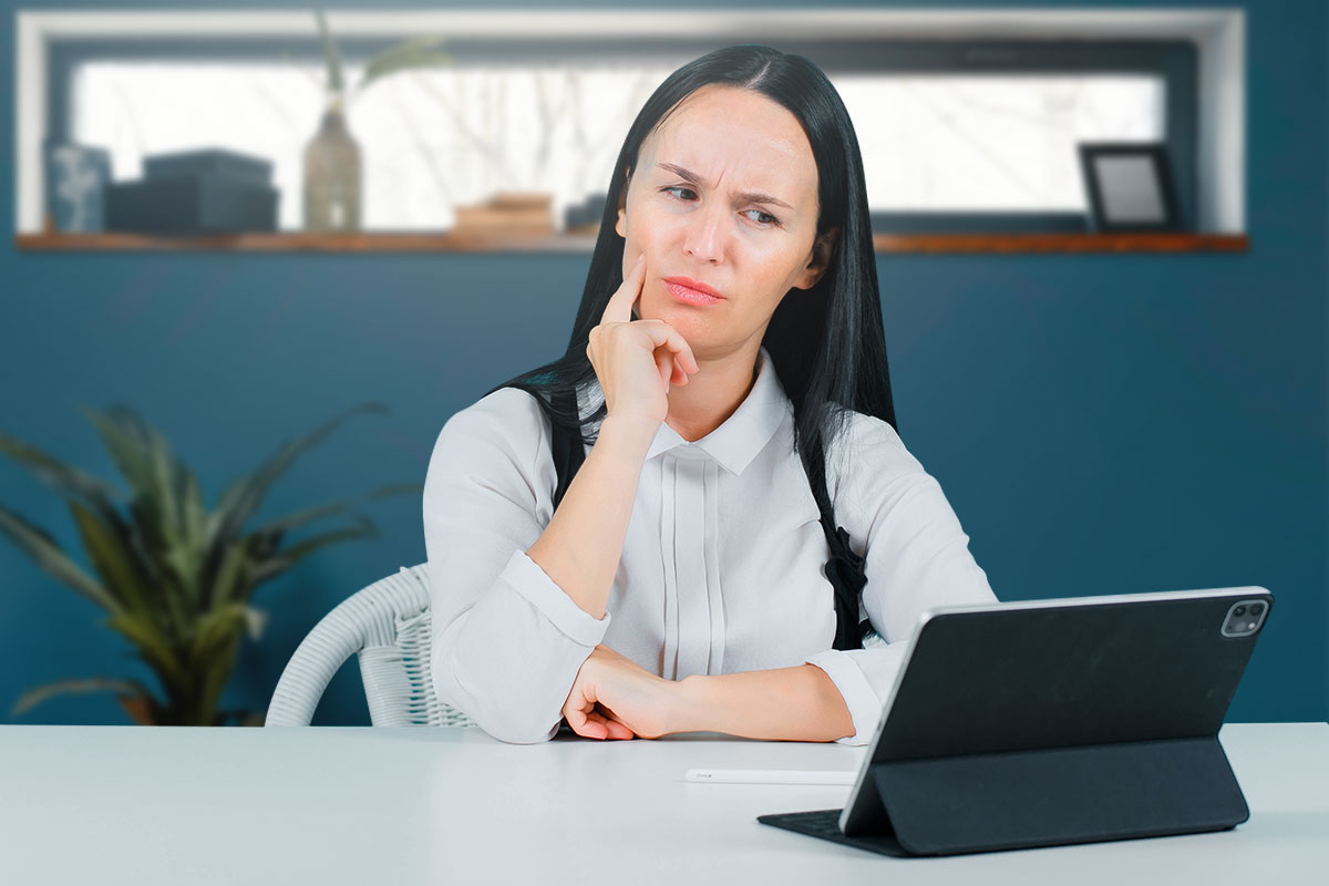 290 Consulting Company Names 2 A confused businesswoman looks at a tablet