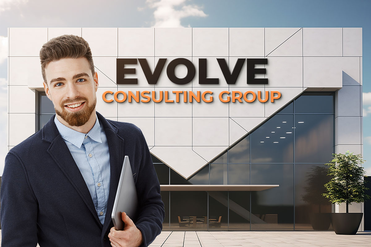290 Consulting Company Names 3 A young businessman holding a laptop, standing in front of an office building labeled "Evolve Consulting Group"