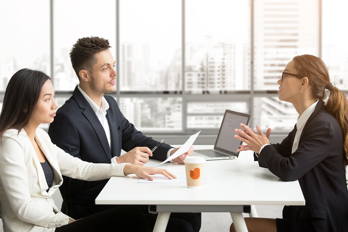 How to Start a $2.88M/Year Recruiting Business 1 Three people in a recruiting team meeting