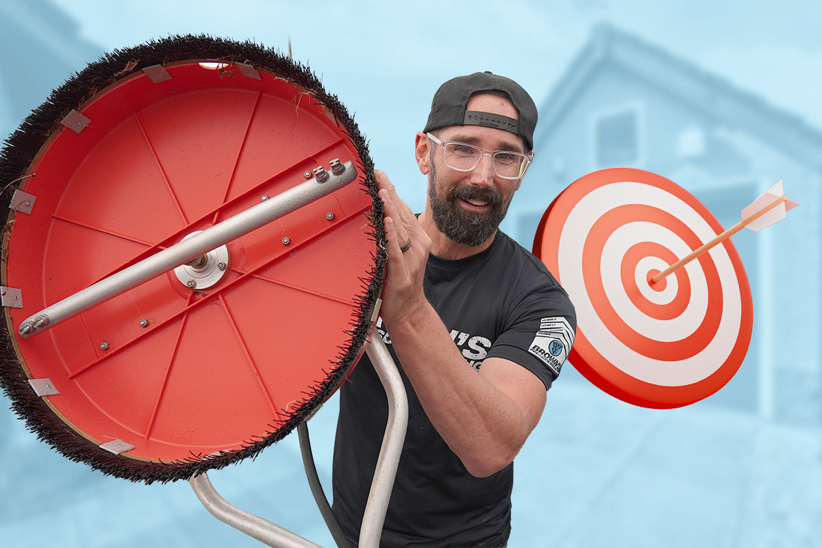 Marketing a Service Business: Ultimate Guide (2025) 6 Brown’s Pressure Washing owner demoing a piece of equipment next to a target with a bullseye in it