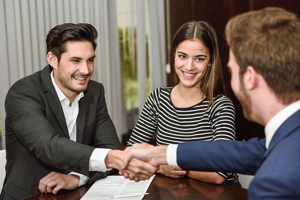 Banker meeting with new clients