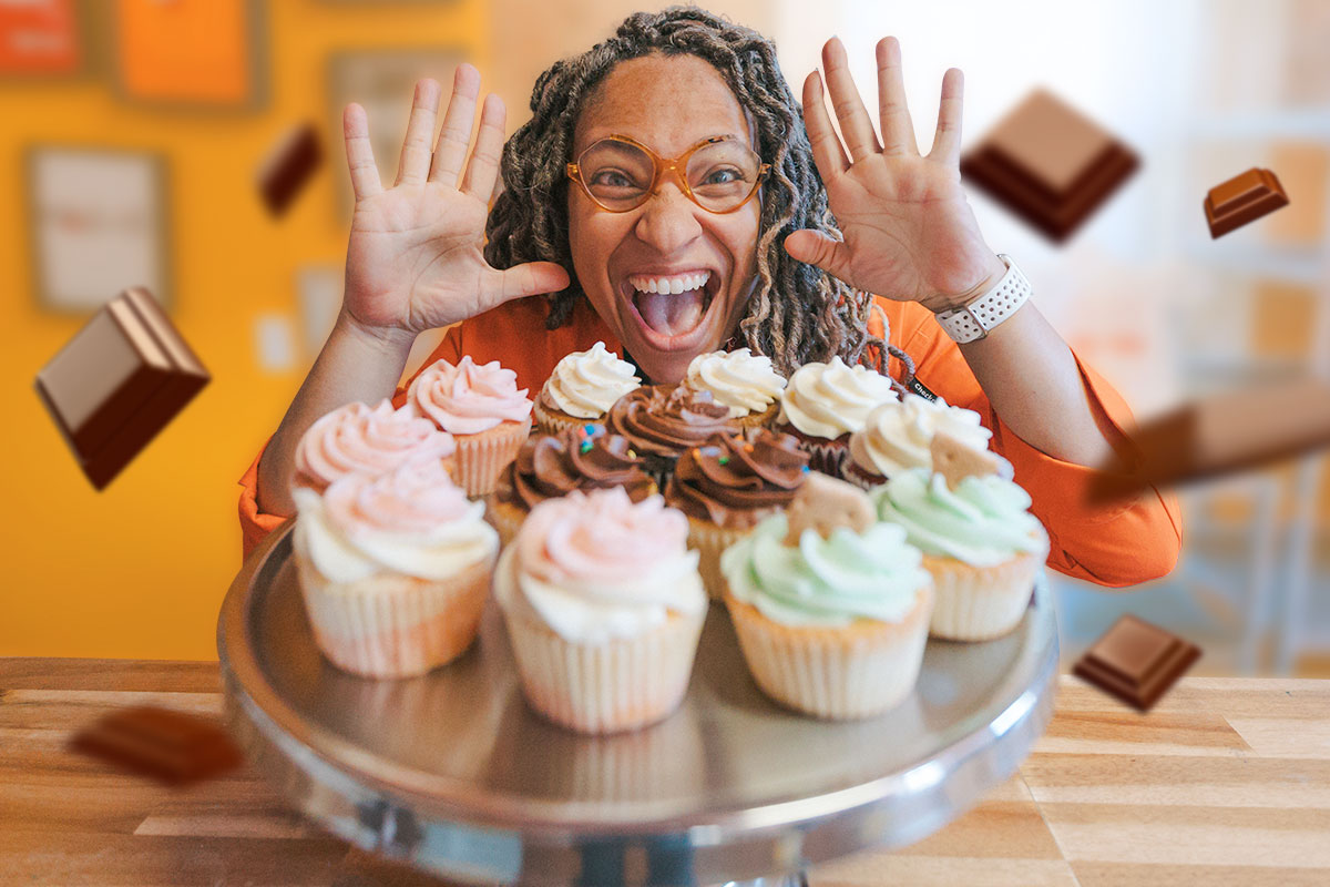 27 Best Business Ideas For Women in 2025 5 Smiling woman with cupcakes on table