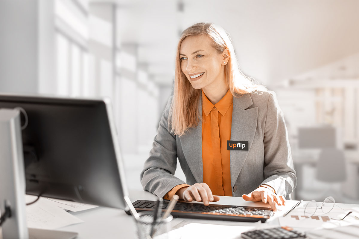 27 Best Business Ideas For Women in 2025 4 Woman working on a desktop at the office
