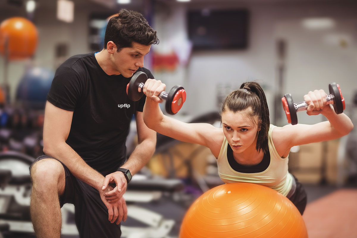 33 Great Business Ideas for Men (to Start in 2025) 6 Fitness coach at the gym