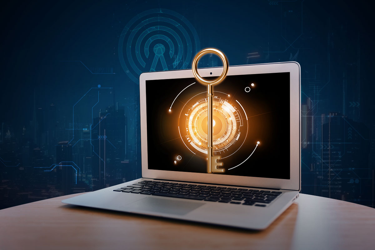 Turnkey Business: The Ultimate Guide (2025) 2 Concept of a laptop with a vault-like image on the screen and a large golden skeleton key emerging from it