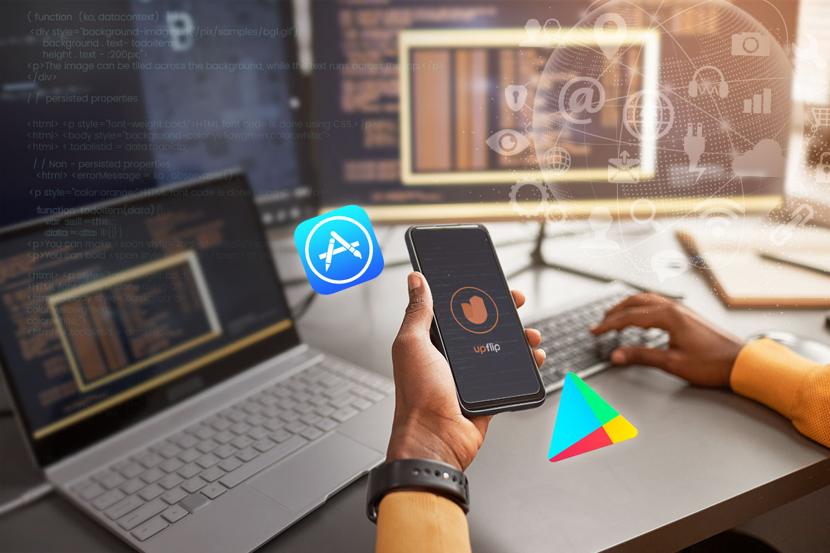 33 Great Business Ideas for Men (to Start in 2025) 1 Software developer with celphone and laptop