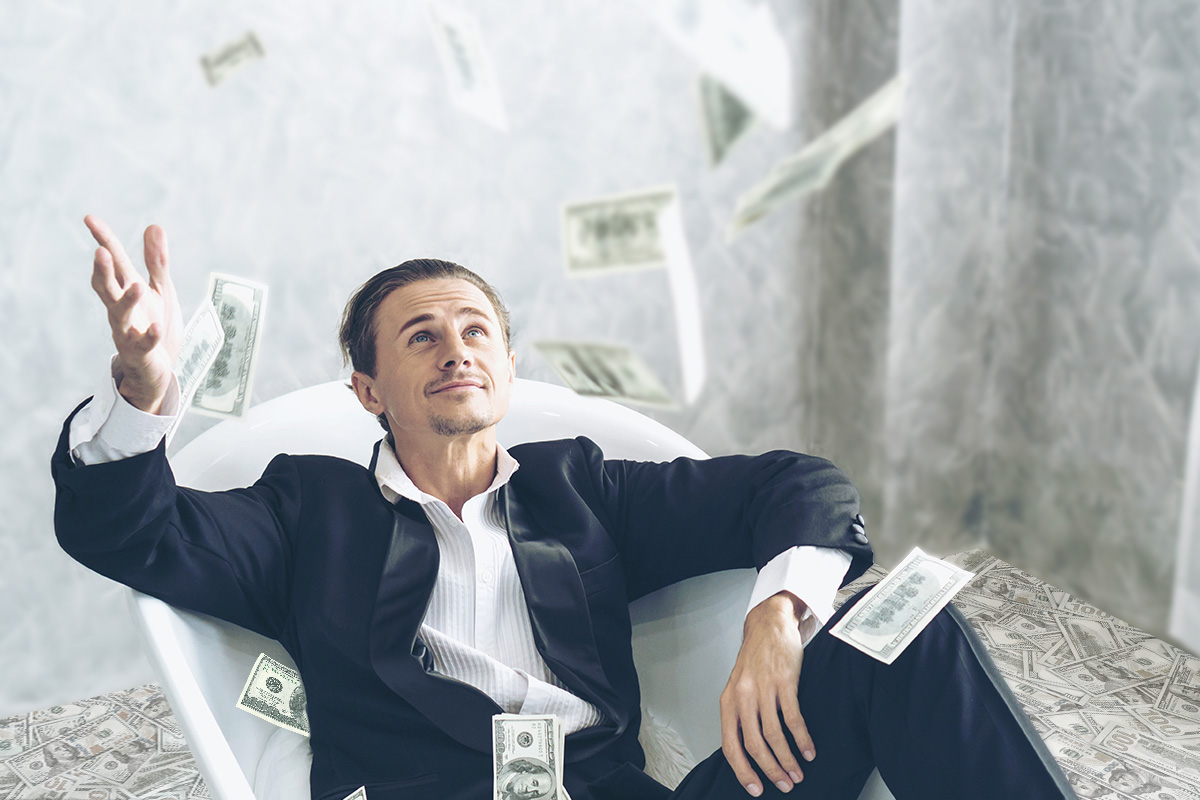 21 Best Million Dollar Business Ideas 5 Man in a suit throwing cash in the air