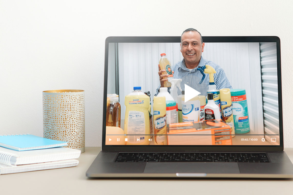 The 16 Best Cleaning Franchises to Own in 2025 3 Chris Mondragon cleaning video on a laptop