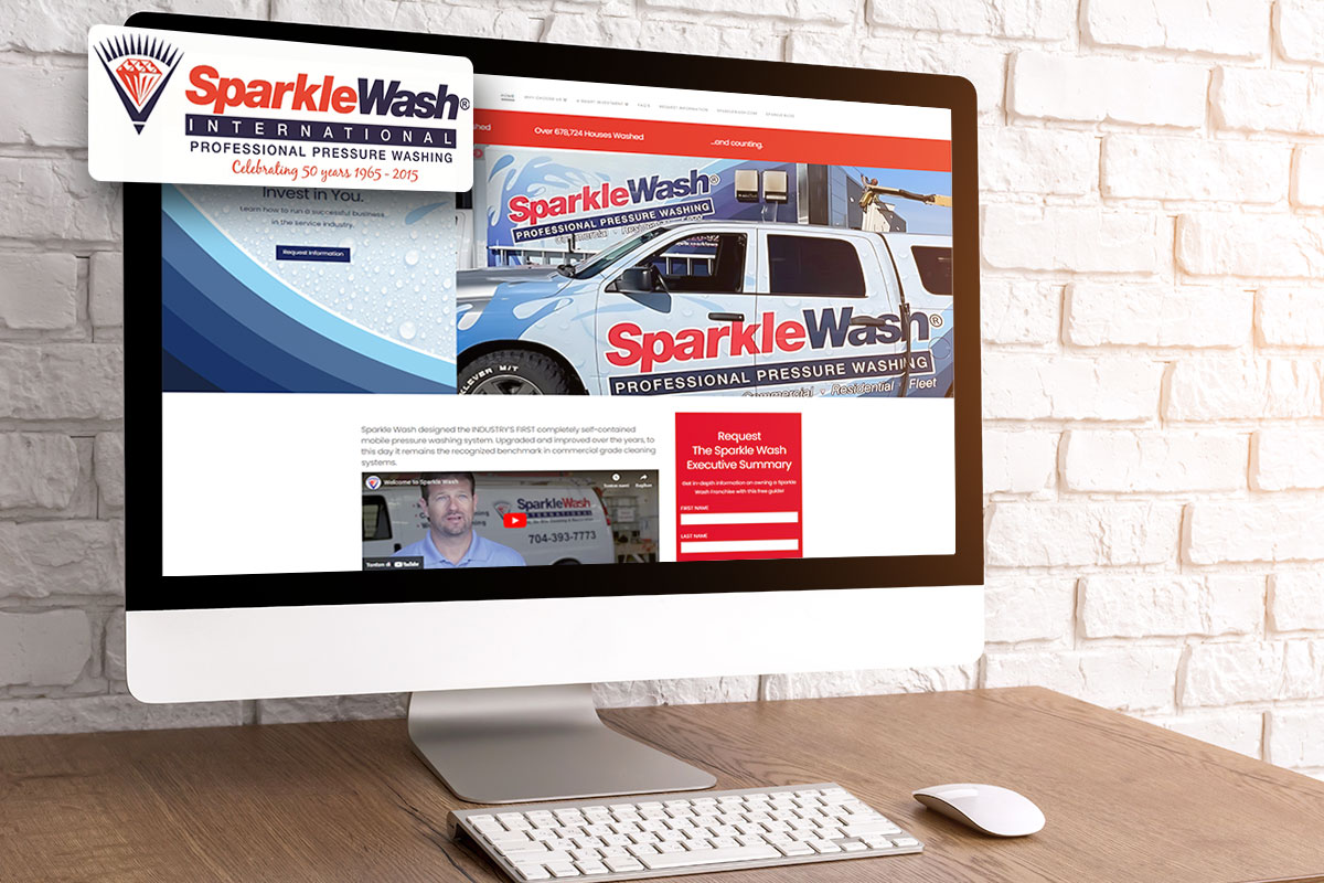 Sparkle Wash International webpage on a desktop computer