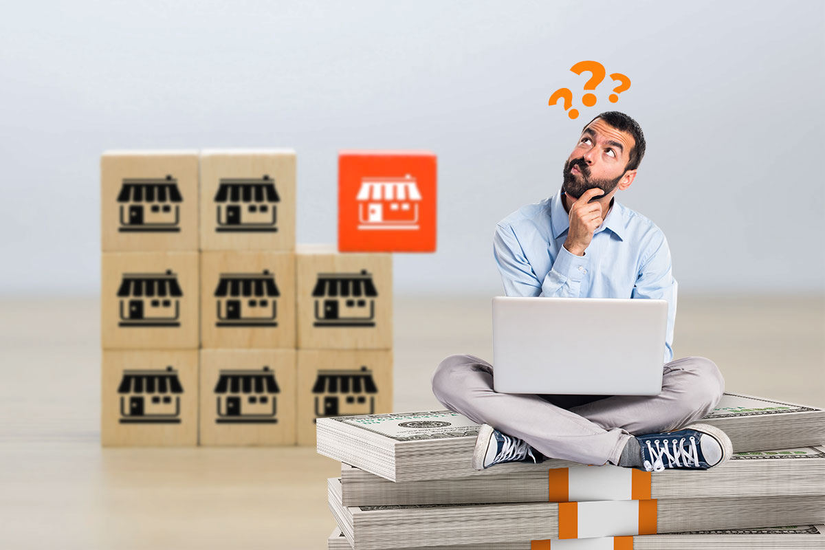 Man using a laptop and thinking about business ideas