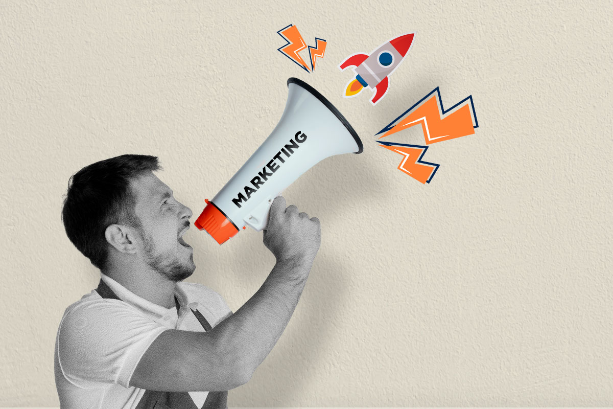 Man speaking on a megaphone with the label "marketing"