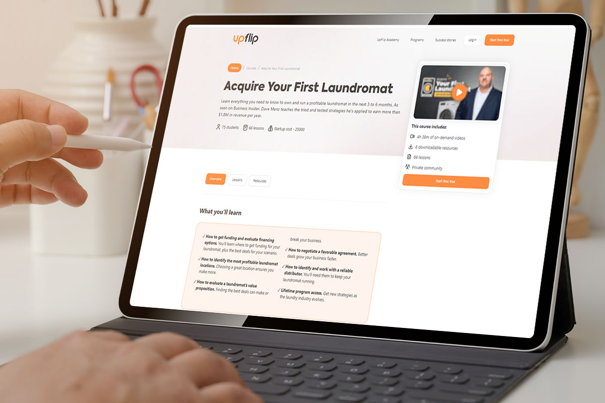 Best Laundromat Franchises of 2025 14 Laptop open to the UpFlip laundromat course website
