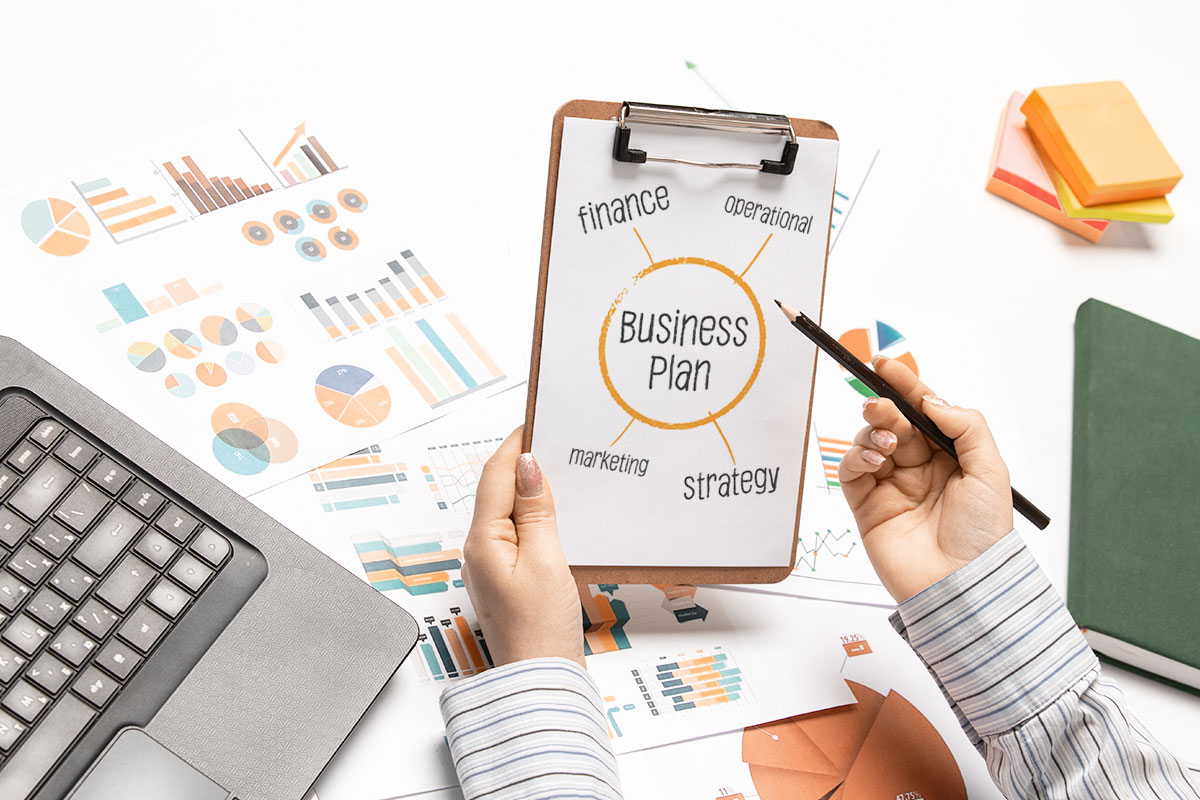 A clipboard showing a diagram of a business plan