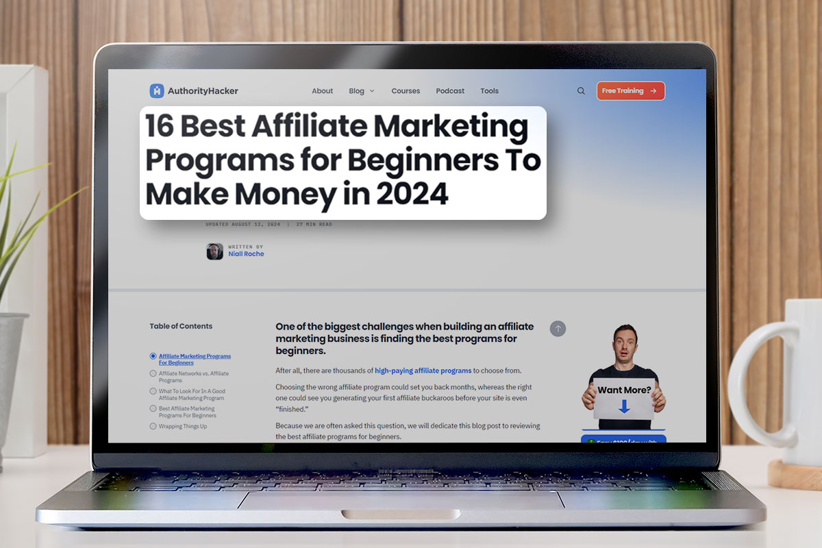 Laptop open to an AuthorityHacker site about affiliate marketing programs