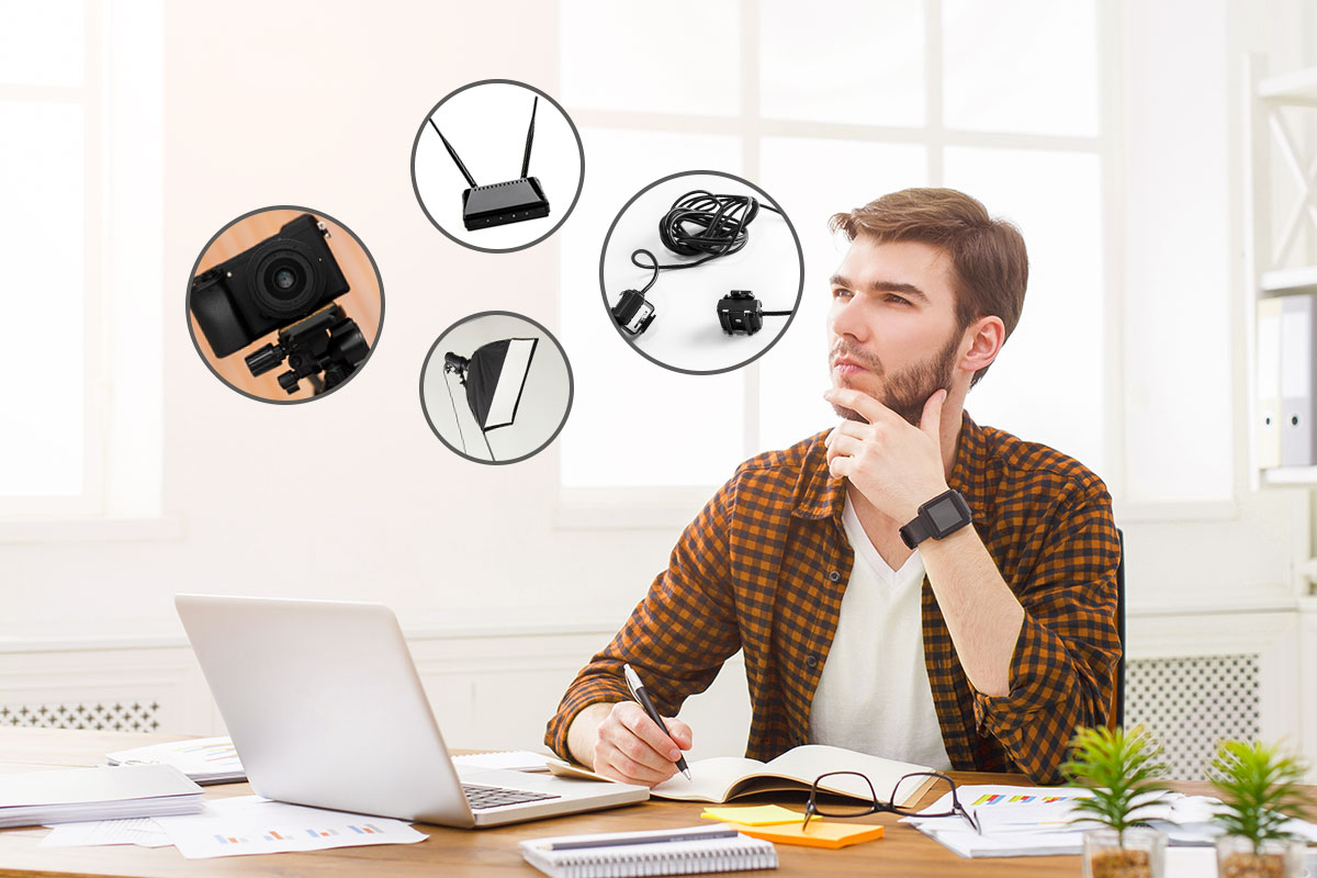 Person thinking about different types of photography equipment