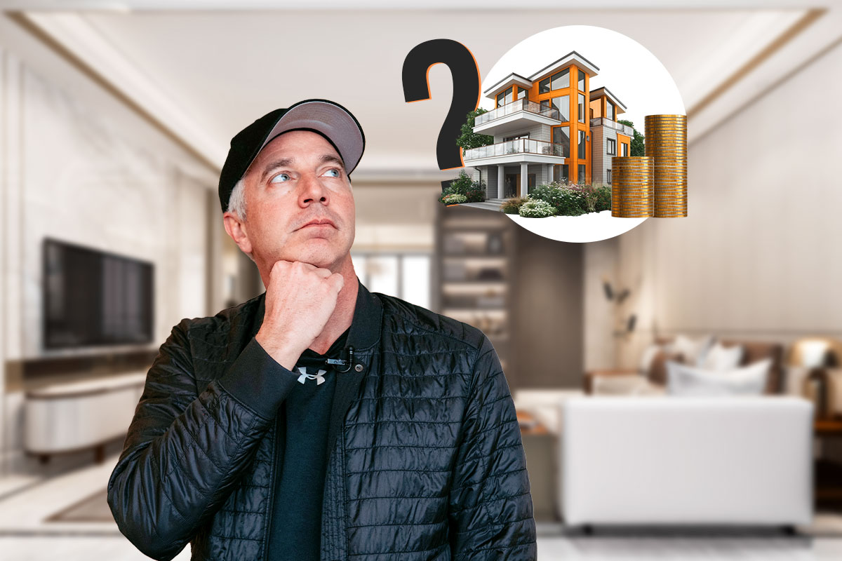 Real estate business owner with a thought bubble showing a large home and a stack of coins