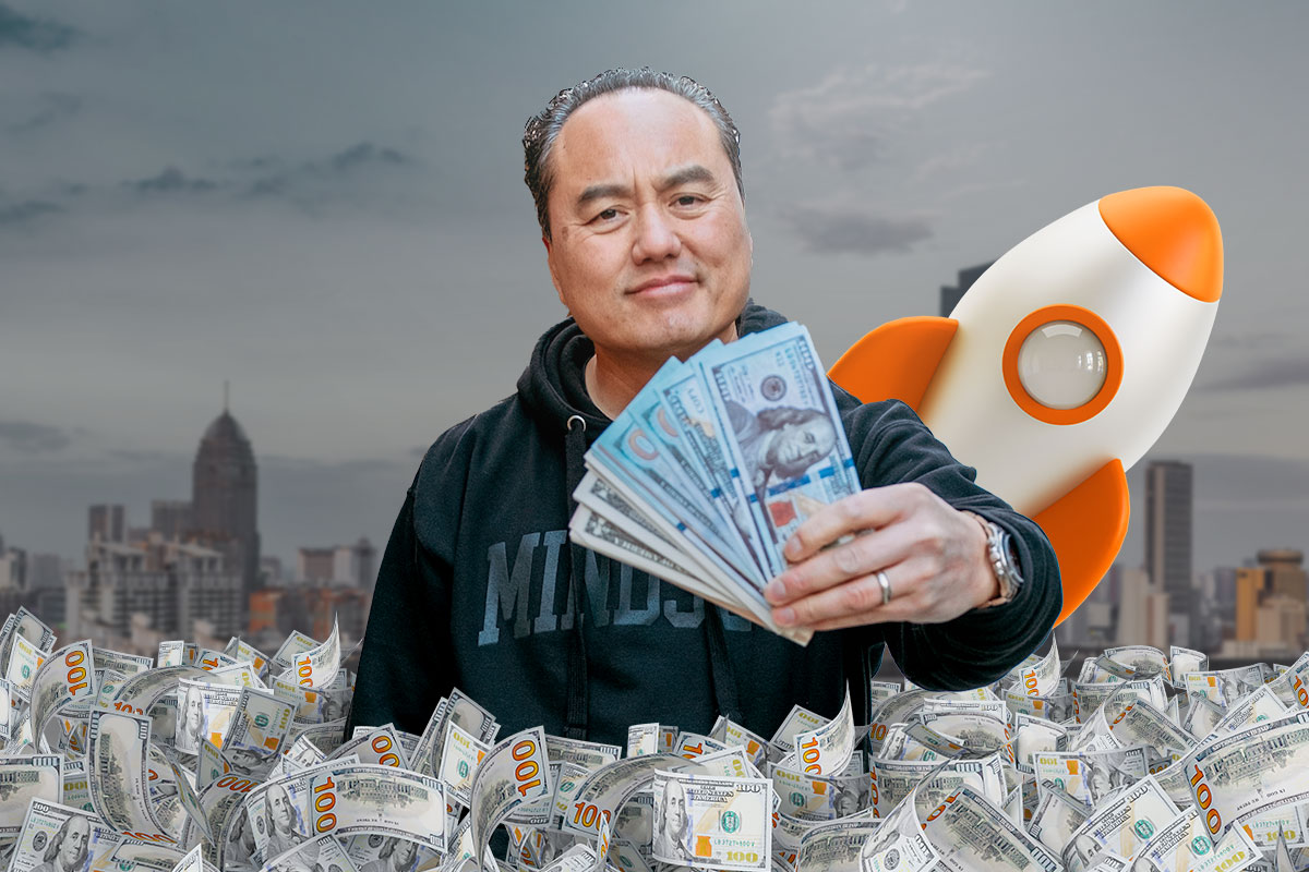 Real estate business owner holding cash with a cartoon rocket in the background