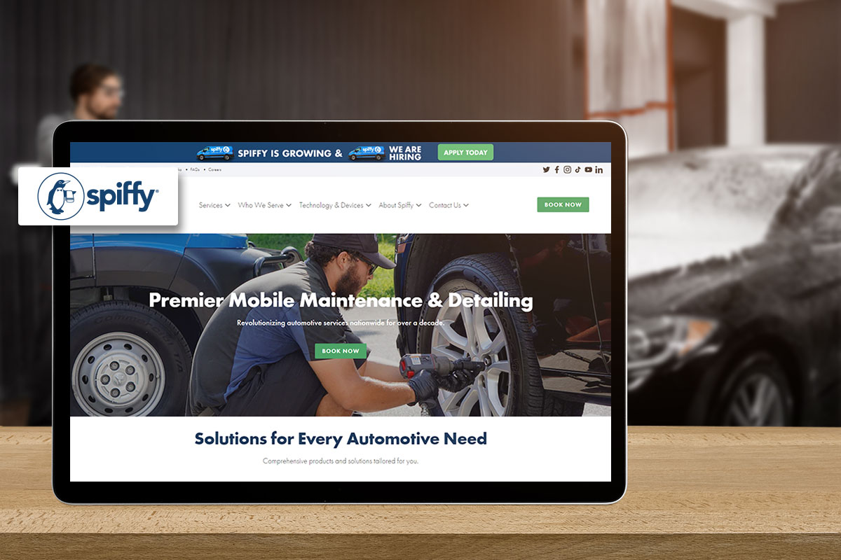 Tablet screen showing the Spiffy automotive site