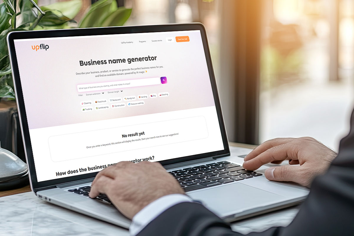 Laptop open to the UpFlip business name generator website