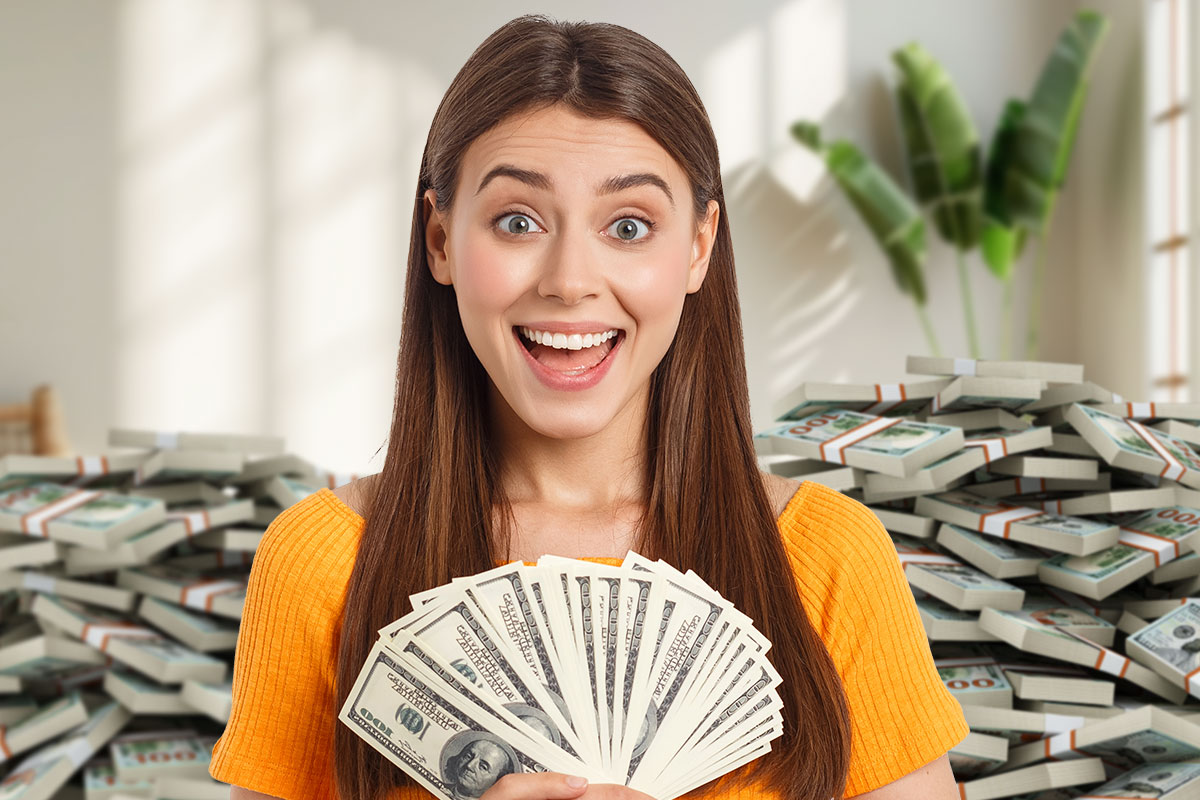 How to Make $1000 a Day 3 A smiling woman holding money surrounded by stacks of cash