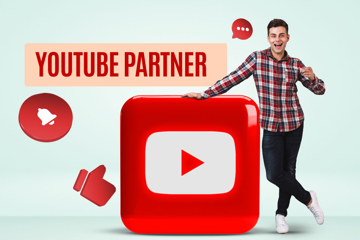 How to Start a $45K/Month YouTube Channel 16 A casually dressed man in jeans and a plaid shirt giving a thumbs up while leaning against an oversized YouTube symbol next to the words "YouTube partner"