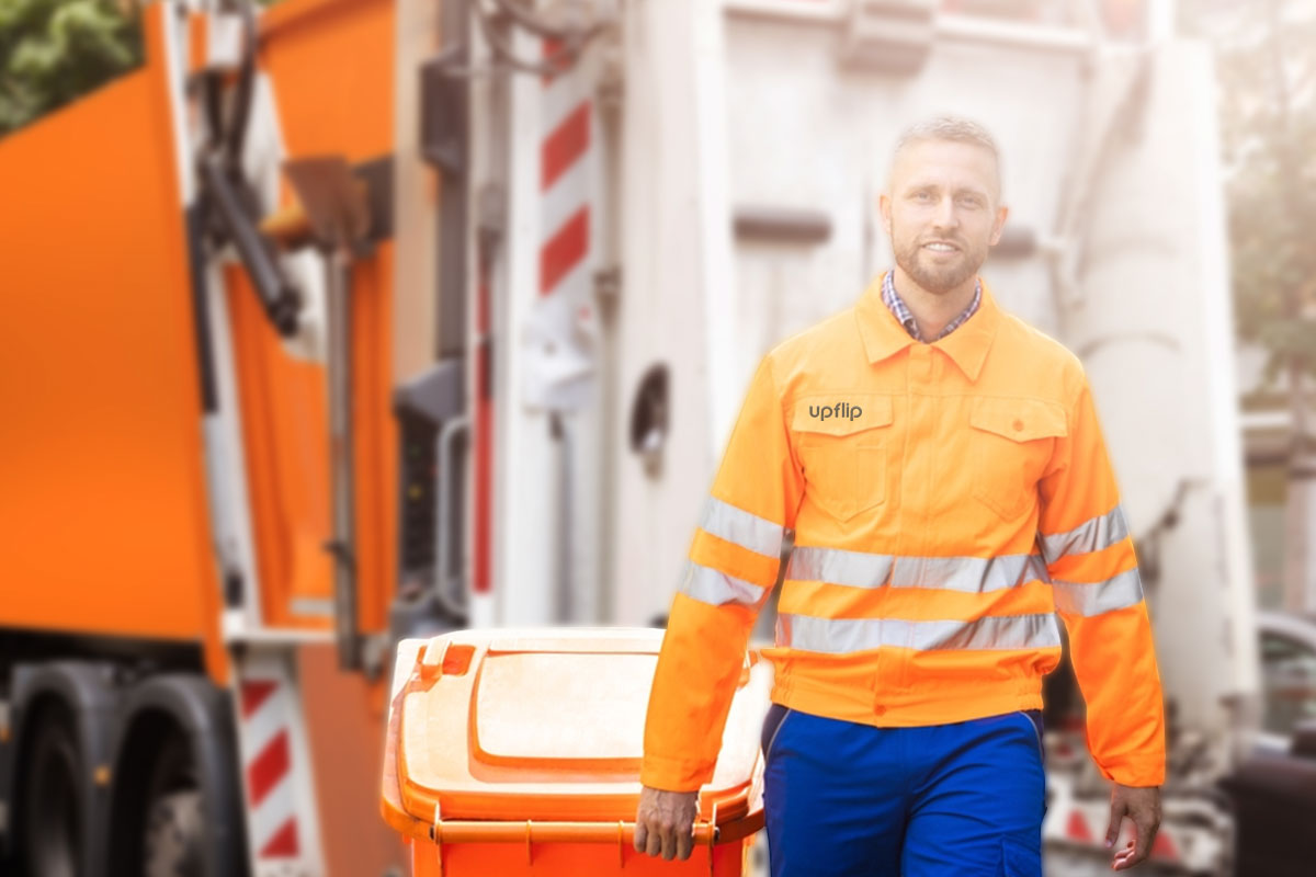 How to Start a $2.5M/Year Junk Removal Business 1 A junk removal business employee in a reflective orange jacket pulling a trash bin with a garbage truck in the background.