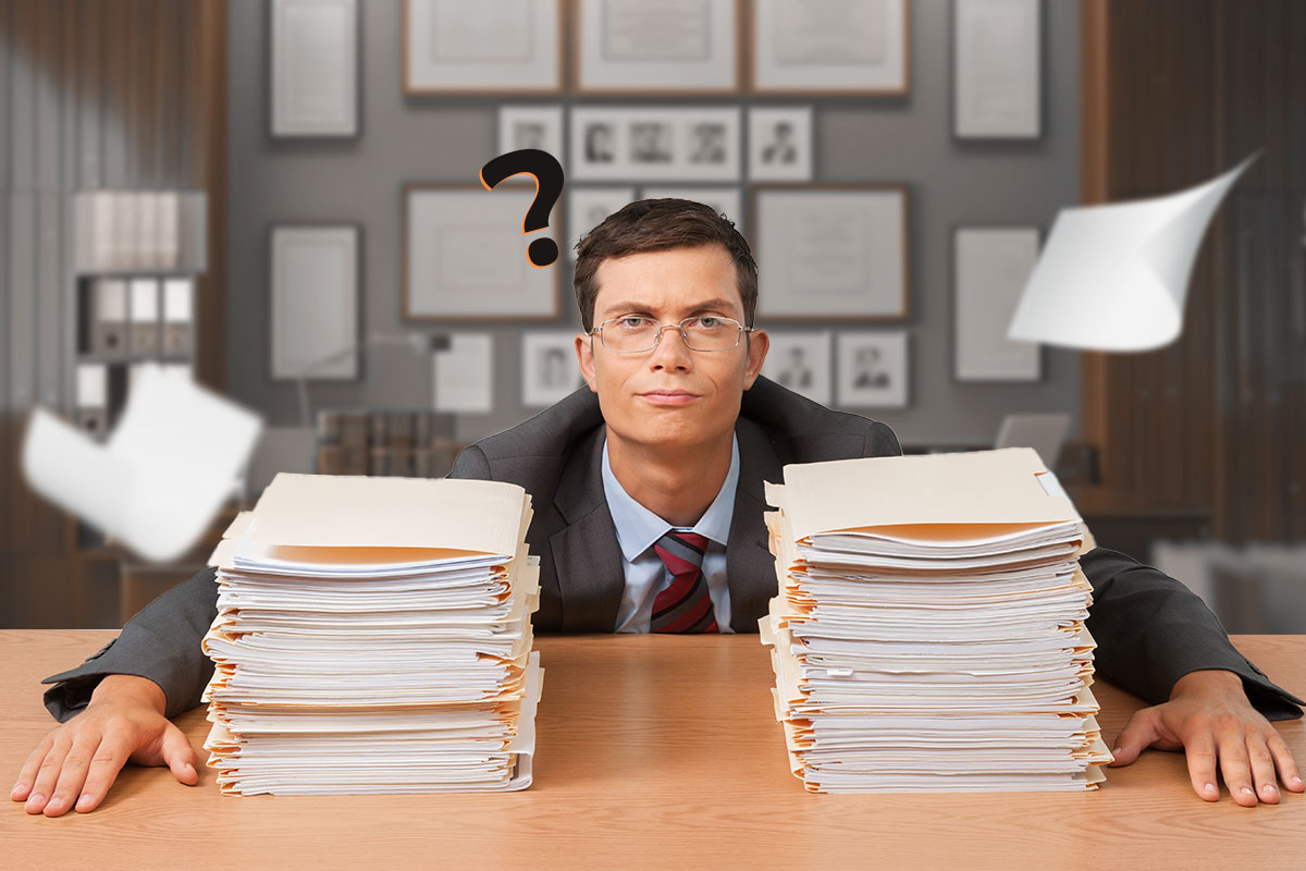 337 Law Firm Names 11 A lawyer with a question mark over his head leaning on a desk with two large stacks of folders.